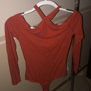 Burnt orange long sleeve body suit